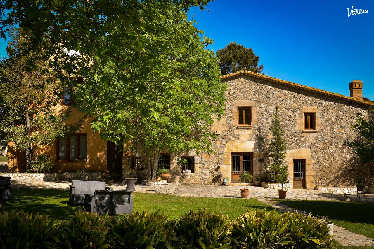 Elegant private venue in Costa Brava with rustic Mediterranean style. 