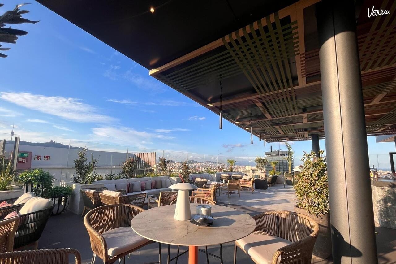 Exclusive rooftop dinner venue in Barcelona with skyline views.