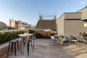 Room Mate Gerard Terraza, sophisticated hotel rooftop venue in Barcelona.
