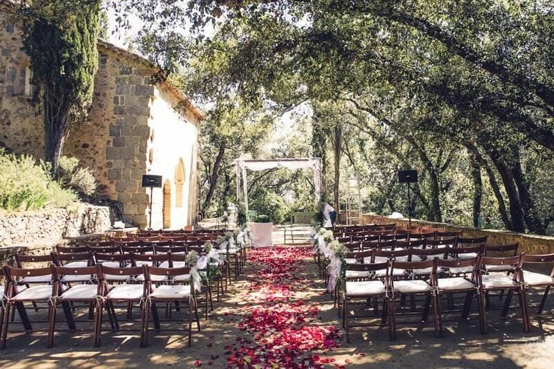  Historic chapel wedding venue in Catalonia surrounded by natural beauty. 